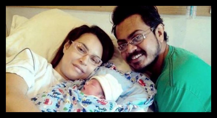 Nadia Hussain with husband and son